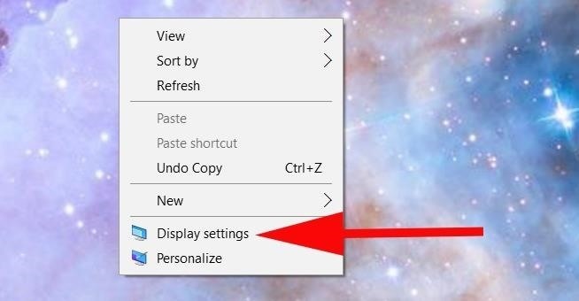 Step 1 to determine and adjust screen resolution is to select option Display Settings